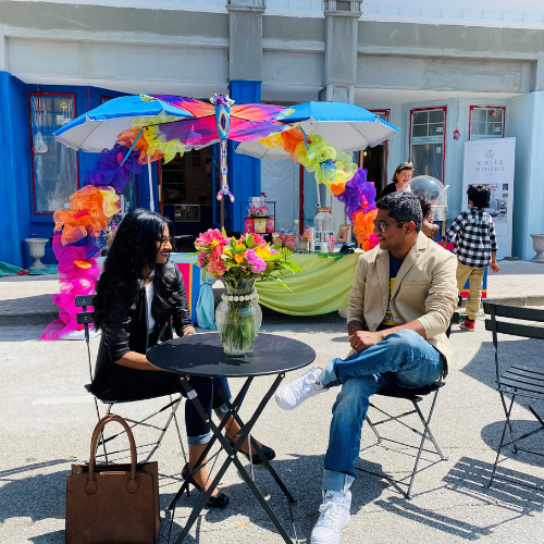 couple sitting at an open air table