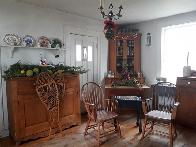 Park House Museum kitchen decorated for the holidays with garland
