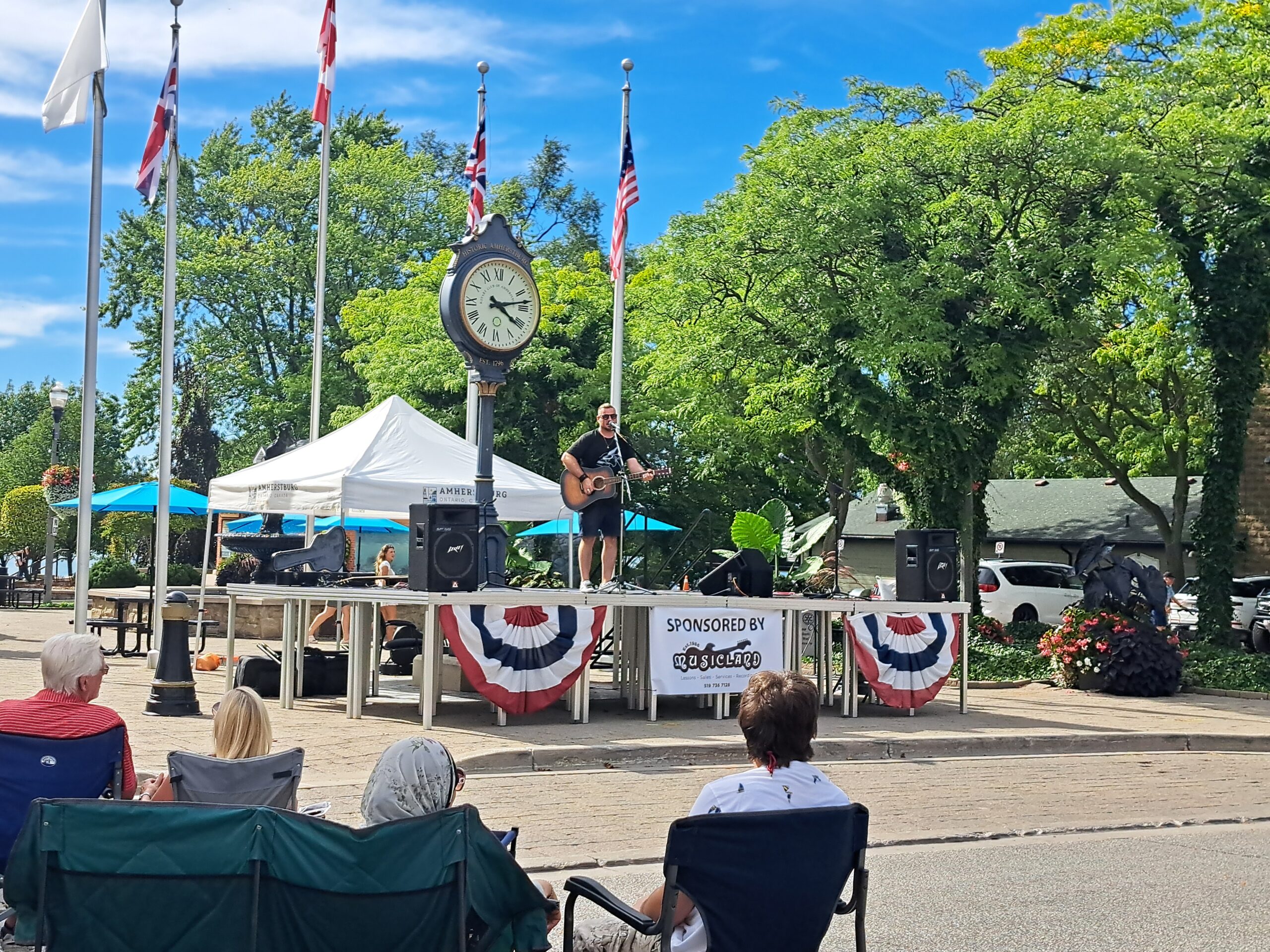 Stage performance by a musicial during AmherstPalooza.