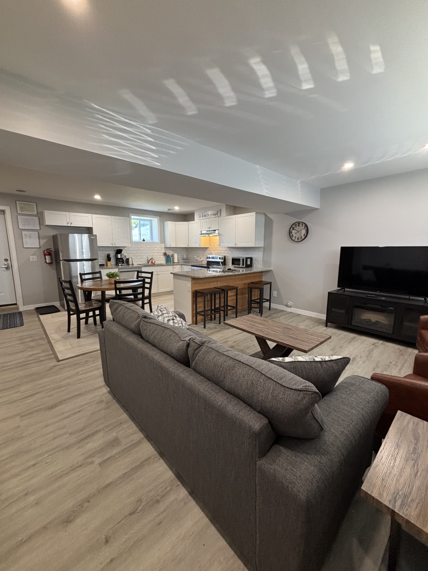 2022 Richmond Retreat short term rental featuring the living room and kitchen setup