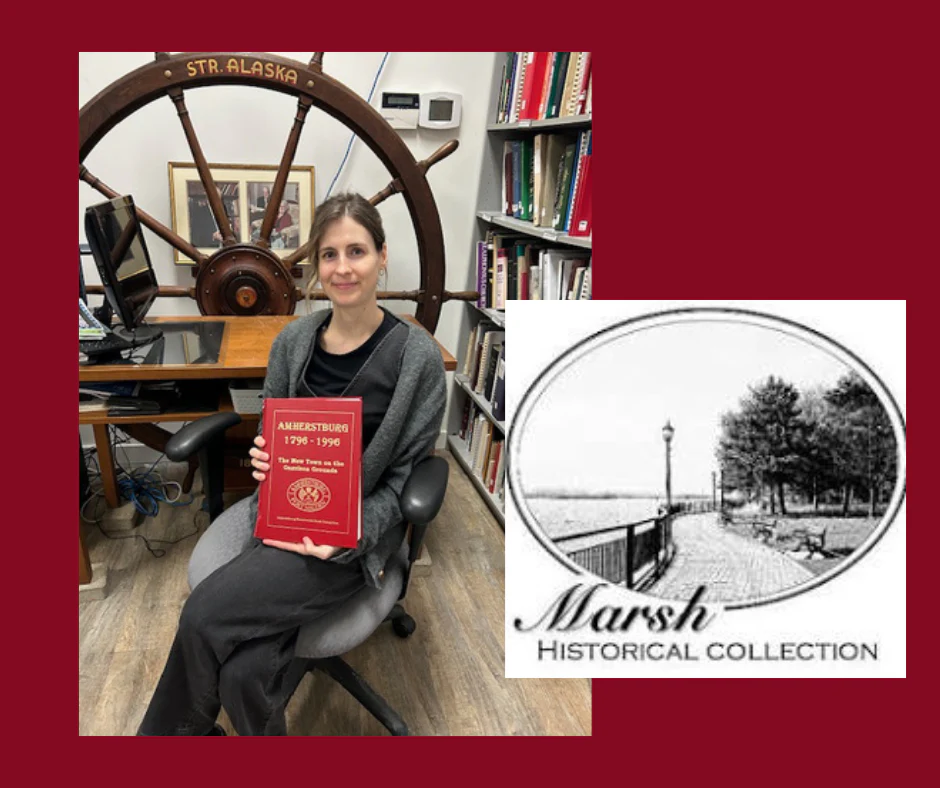 Marsh Historical Collection featuring curator Meg Reiner holding a book about Amherstburg