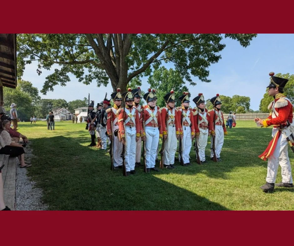 Red coat soldiers line up in a demonstration at Fort Malden